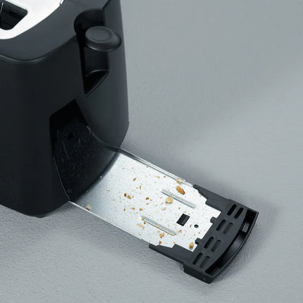 Brödrost från Nordic Cookware med utdragbar smulbricka på grå bänk