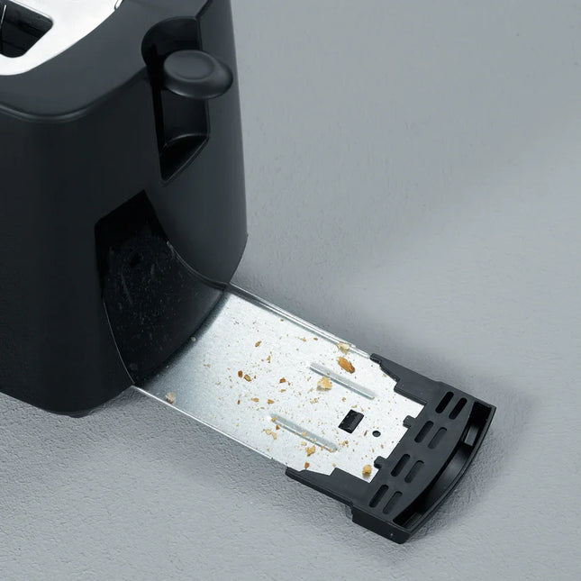Brödrost från Nordic Cookware med utdragbar smulbricka på grå bänk