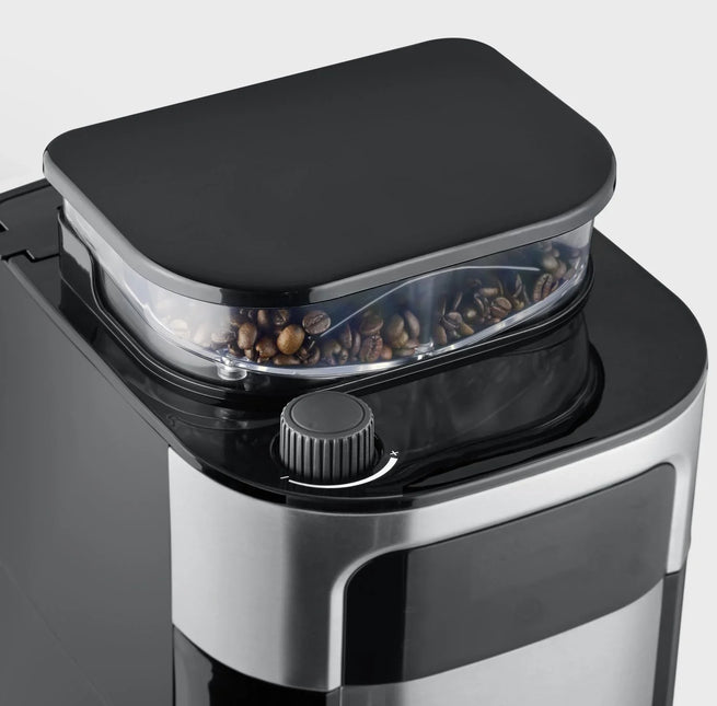 Modern kaffekvarn i svart och rostfritt stål med kaffebönor, Nordic Cookware