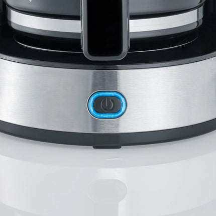 Närbild av kaffebryggares rostfria strömknapp, Nordic Cookware köksutrustning