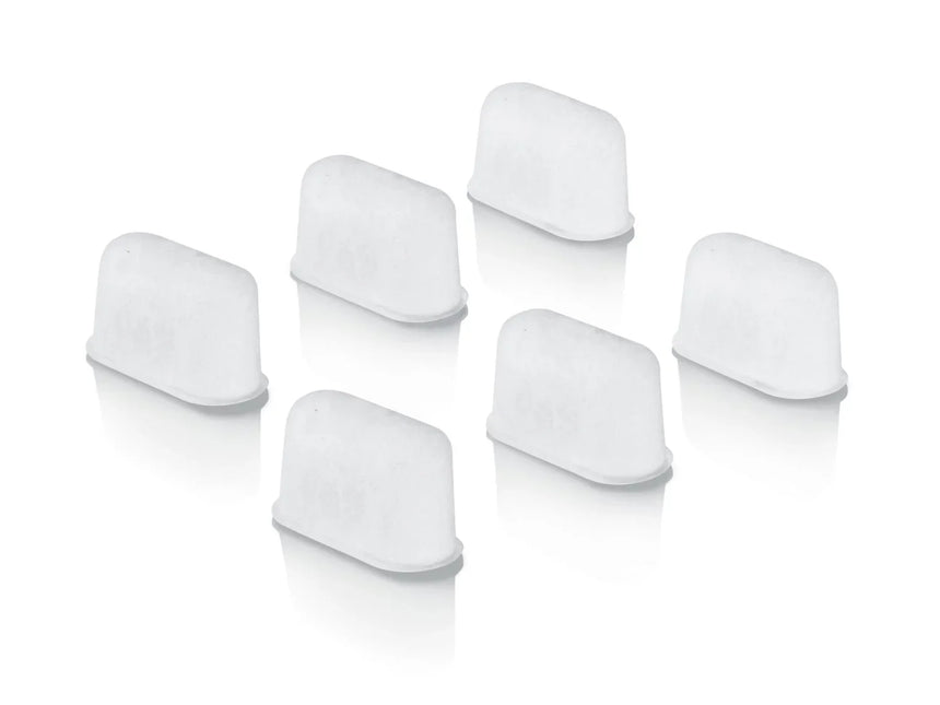 Sex vita rektangulära isbitar på vit bakgrund, Nordic Cookware kökstilläbehör.