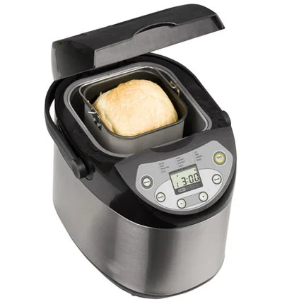 Brödbakmaskin i rostfritt stål med nybakat bröd, Nordic Cookware köksutrustning