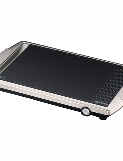 Rektangulär elektrisk stekhäll i rostfritt stål från Nordic Cookware på vit bakgrund.