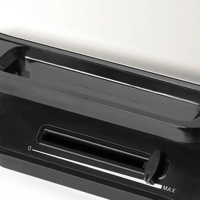 Svart justerbar kontroll på köksapparat från Nordic Cookware, modern design