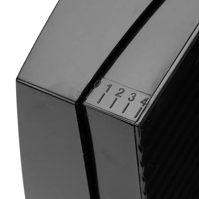 Närbild av svart justerbar köksutrustning från Nordic Cookware med numrerad ratt 0–4.