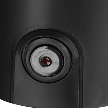 Närbild av svart cirkulär knapp på Nordic Cookware köksprodukt