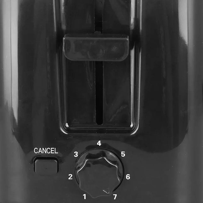 Närbild av svart brödrost med vred och avbrytknapp, Nordic Cookware köksapparat