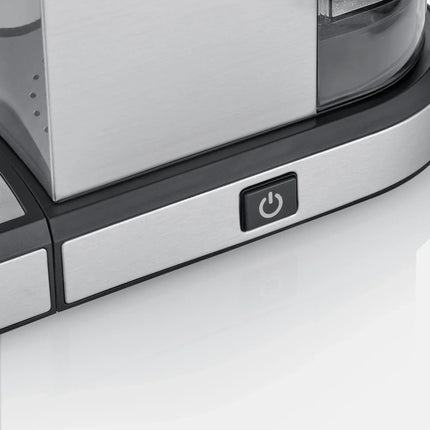 Närbild av rostfri köksmaskin med strömbrytare, Nordic Cookware-design