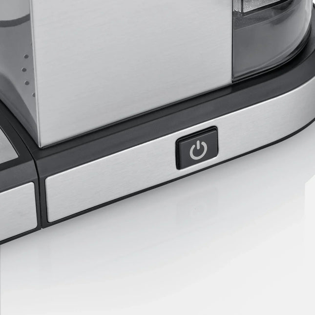 Närbild av rostfri köksmaskin med strömbrytare, Nordic Cookware-design