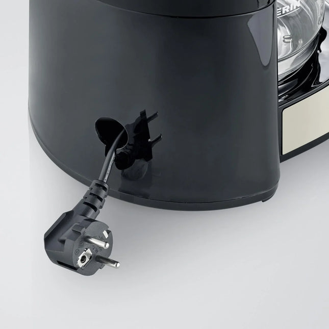 Närbild av svart köksapparat med sladdfack, elsladd och kontakt, Nordic Cookware